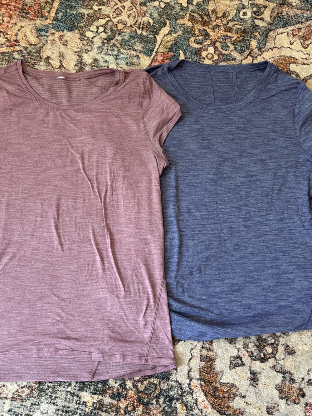 Pair of lululemon athletica t shirts In Mauve & Heathered purple